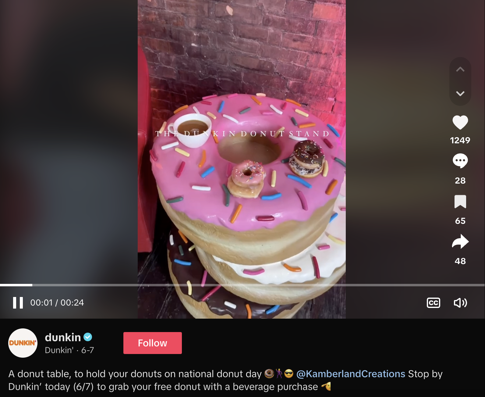 Dunkin' TikTok post showing how they celebrated a hashtag holiday in 2024 by offering free donuts with beverage purchases, promoted with a cheeky social media message.