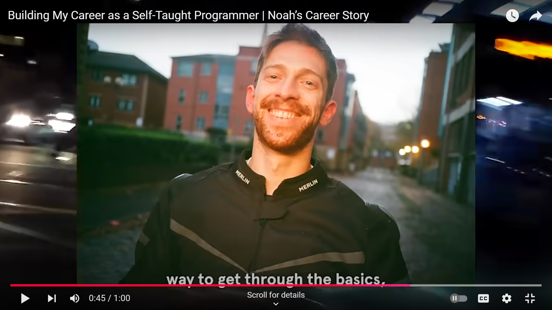 Codecademy YouTube video on Noah’s story, featuring him smiling in a motorcycle jacket.