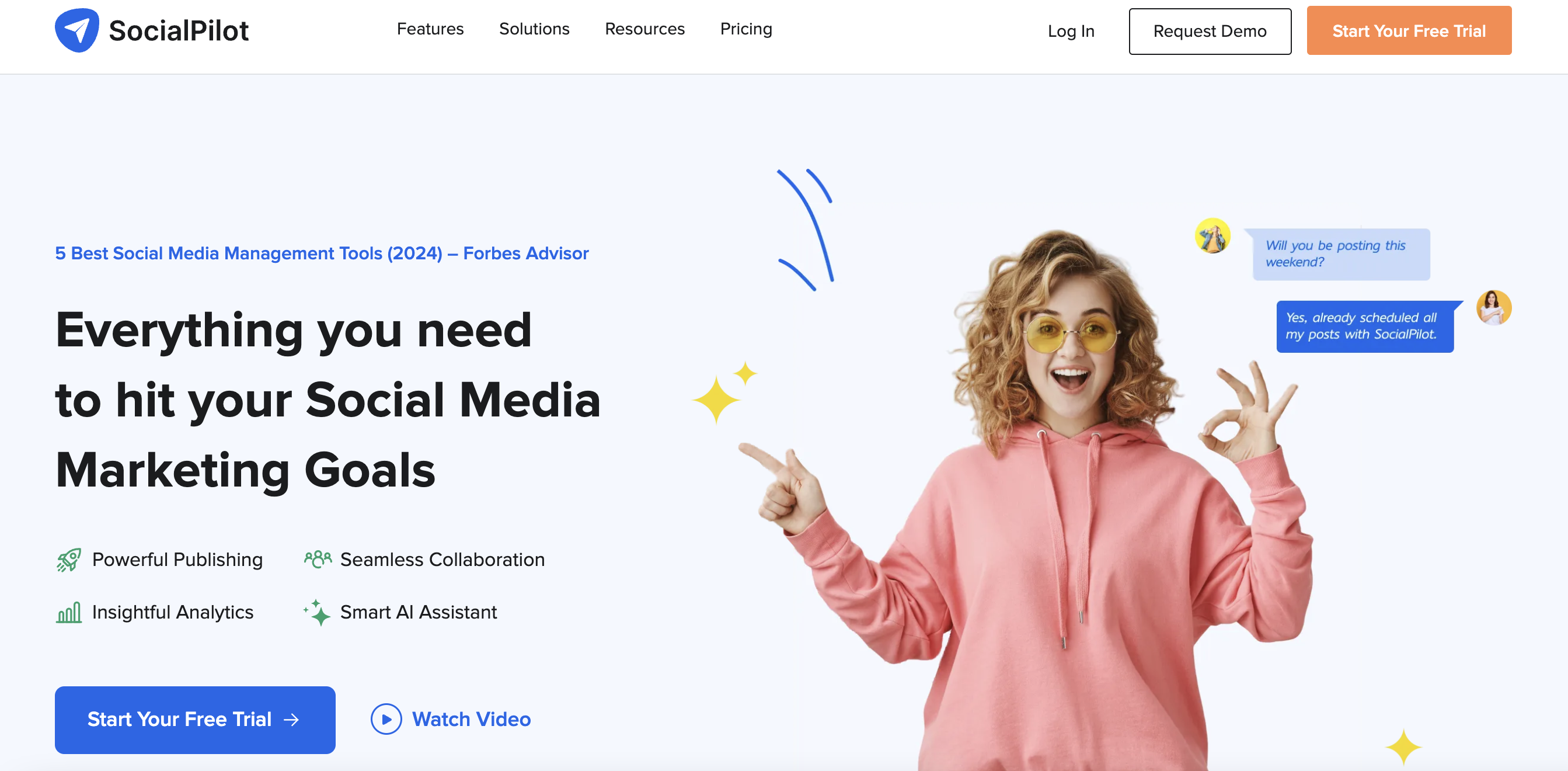 socialpilot homepage with a woman wearing a pink hoodie making an 